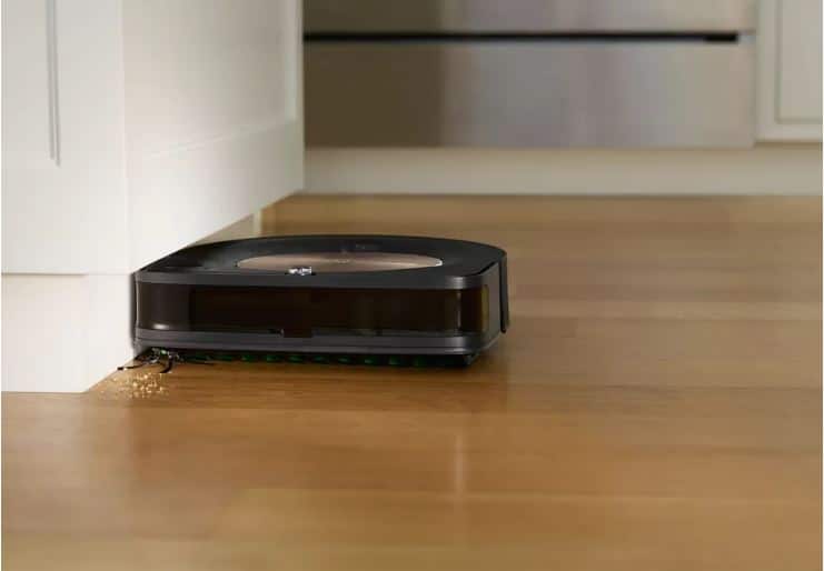The Roomba s9+ cleaning the edges with its angled brush. Image via iRobot