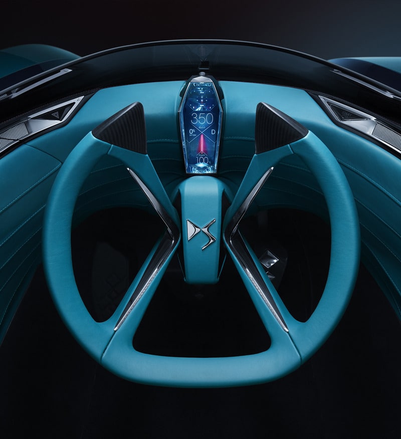 The steering wheel as seen from the driver's cockpit. Image via DS